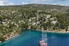 Voyage achored in a secluded cove.